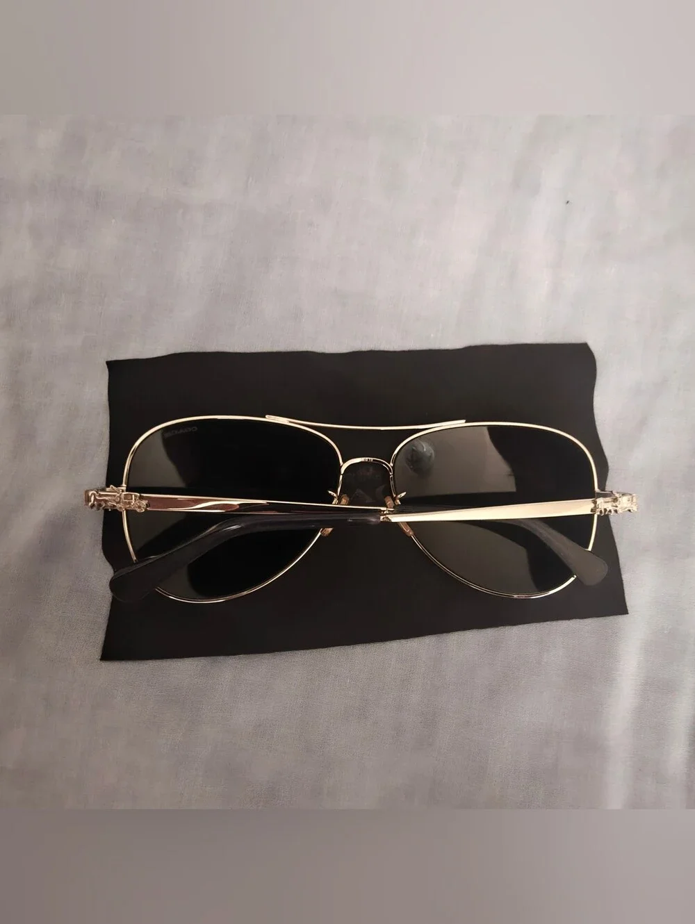 Coach Sunglasses with Silver Frame and Blue Lenses